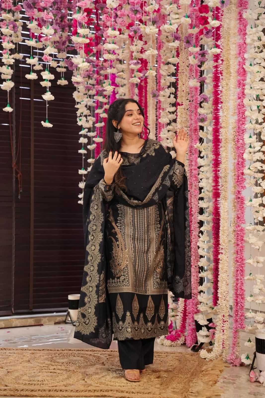 The showcases a beautiful and elegant Indian ethnic wear set. The combination of gold accents creates a sophisticated and timeless look