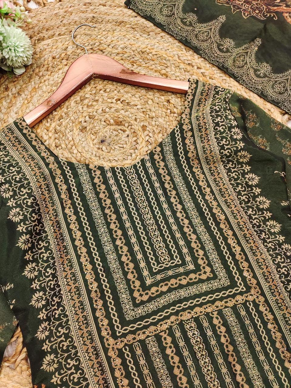 The showcases a beautiful and elegant Indian ethnic wear set. The combination of gold accents creates a sophisticated and timeless look