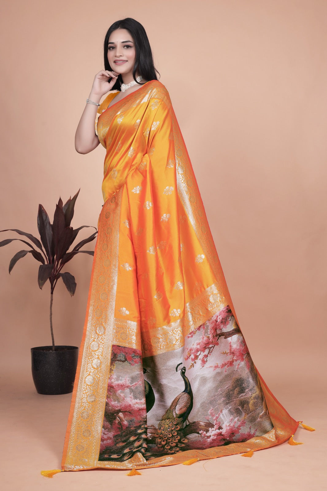 Radiant Orange Silk Saree with Peacock Pallu