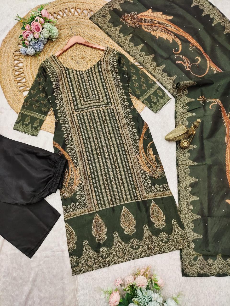 The showcases a beautiful and elegant Indian ethnic wear set. The combination of gold accents creates a sophisticated and timeless look