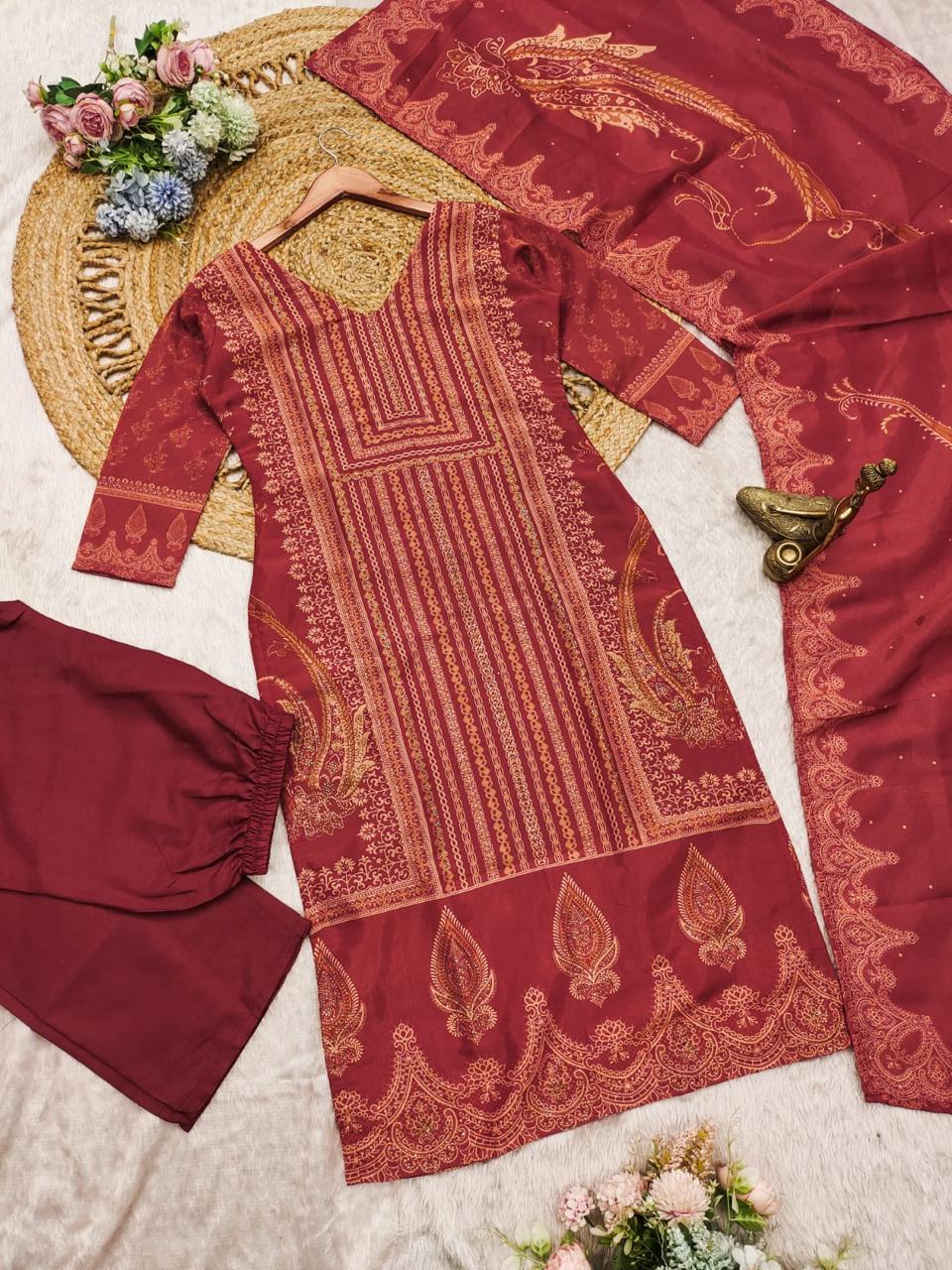 The showcases a beautiful and elegant Indian ethnic wear set. The combination of gold accents creates a sophisticated and timeless look