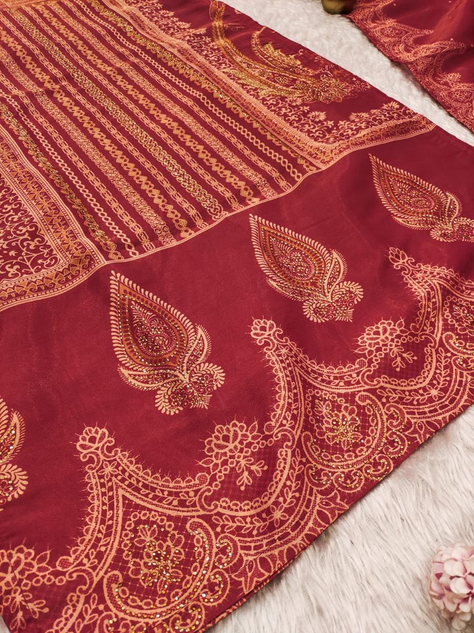 The showcases a beautiful and elegant Indian ethnic wear set. The combination of gold accents creates a sophisticated and timeless look