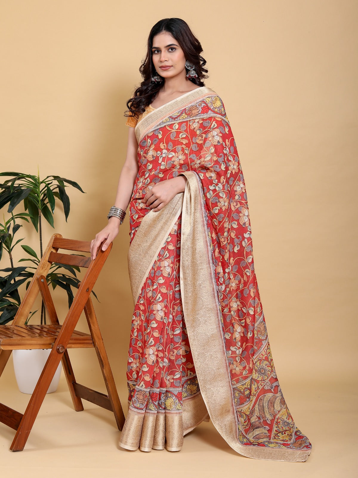 Vibrant Red Kalamkari Print Saree with Broad Zari Border