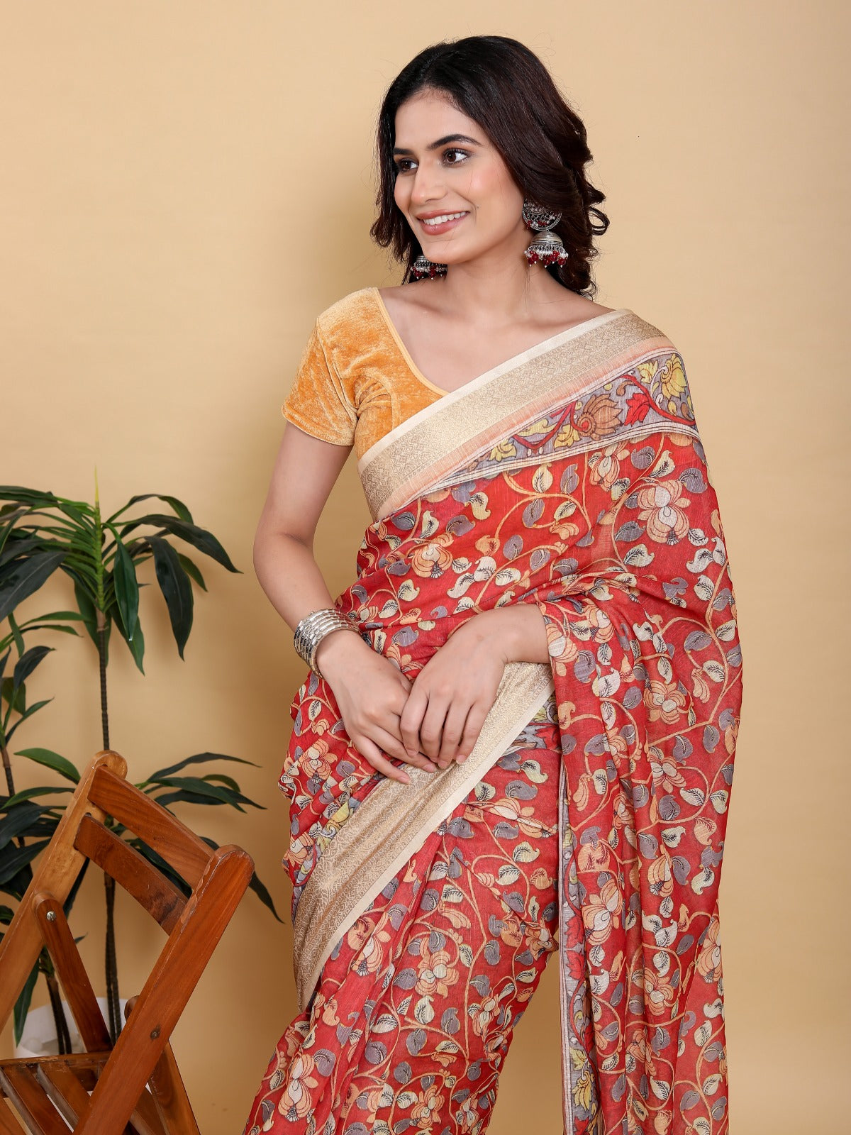 Vibrant Red Kalamkari Print Saree with Broad Zari Border