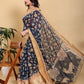 Elegant Navy Blue Floral Print Saree with Deer Motif and Zari Border