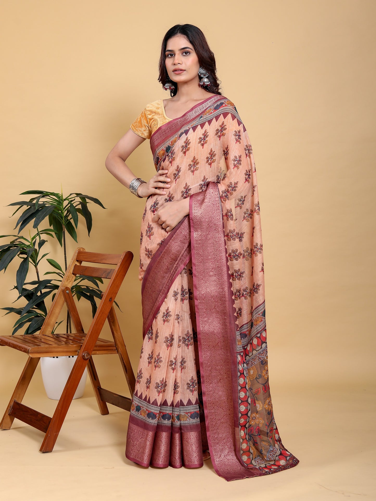 Elegant Peach/Coral Floral Print Saree with Maroon Zari Border