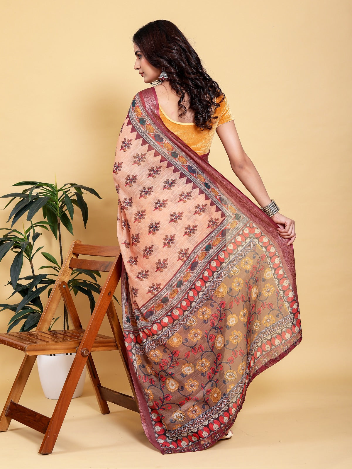 Elegant Peach/Coral Floral Print Saree with Maroon Zari Border