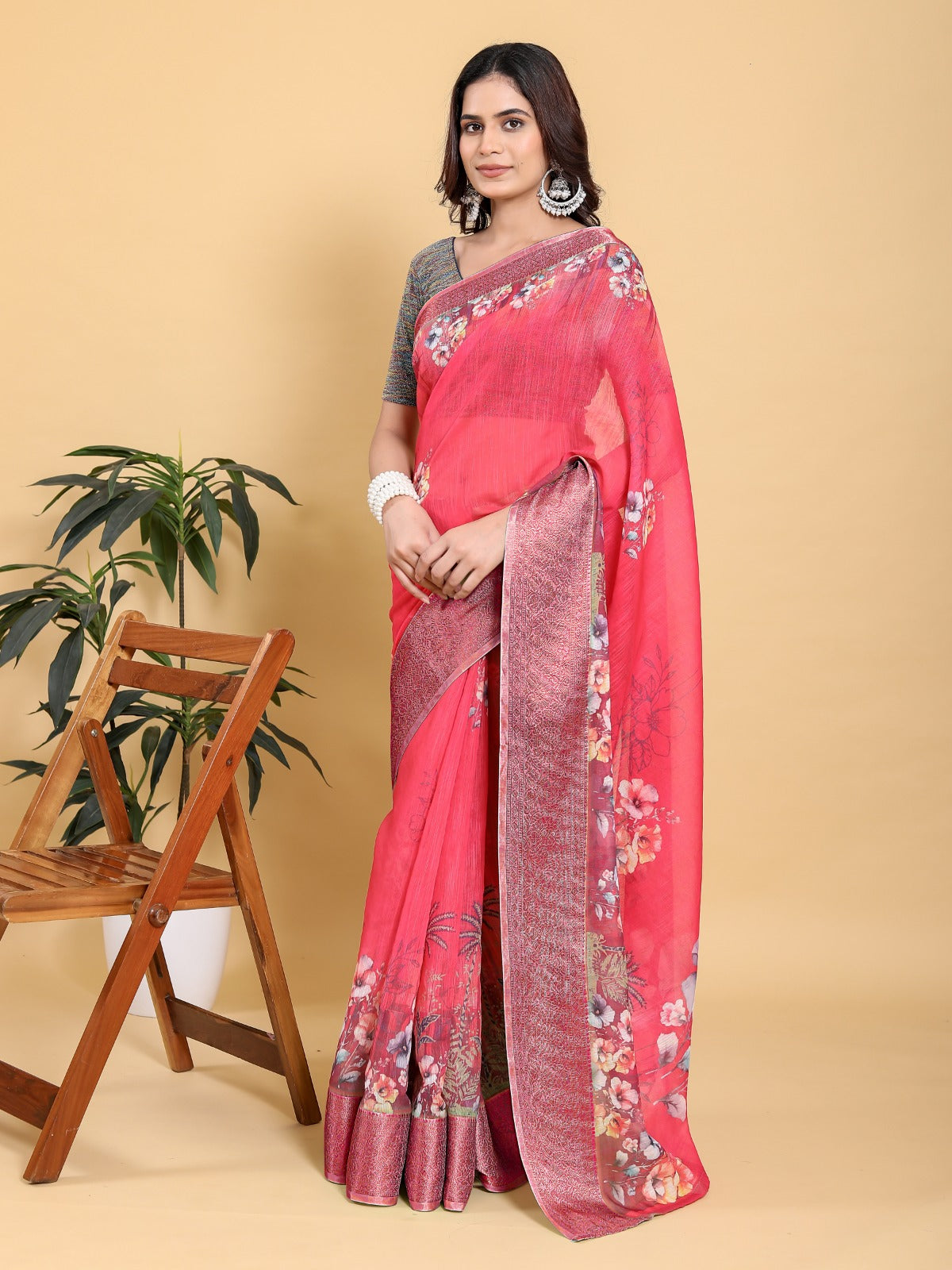 Vibrant Rani Pink Floral Saree with Contrast Green Zari Border